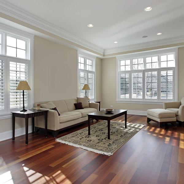 laminate flooring is made from synthetic materials and is more cost-effective than hardwood flooring